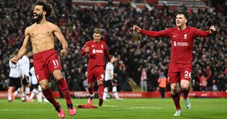 Mohamed Salah of Liverpool celebrates after scoring the sixth goal during the Premier League match between Liverpool FC and Manchester United at Anfield on March 05, 2023 in Liverpool, England.