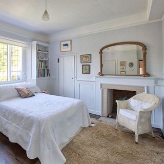 bedroom with wooden flooring