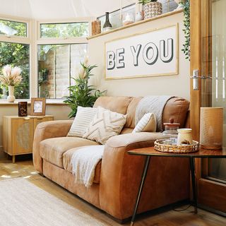 neutral living room with leather sofa