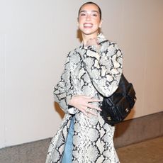 Dua Lipa wearing snakeskin trend