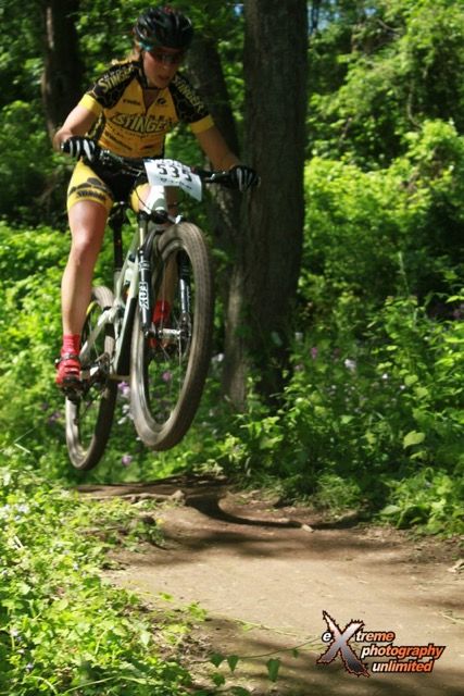 Abigail Strigel gets airborne after the "Rip-n-Ride" descent on the course
