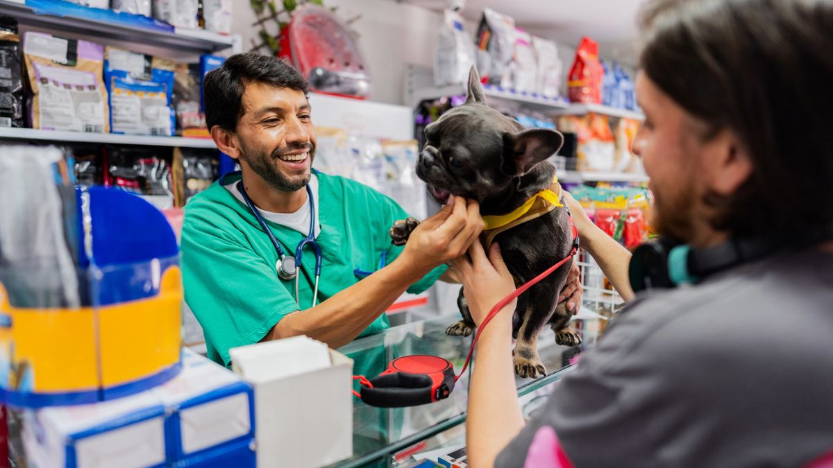 Man with his dog at a pet shop