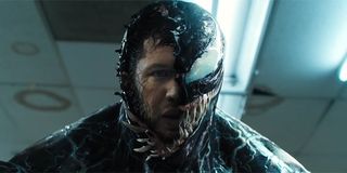 Venom revealing Eddie Brock beneath the symbiote suit