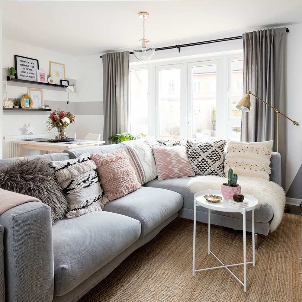 living room with sofa and white round table