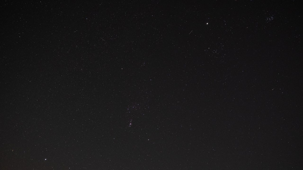Orion constellation, Jupiter and the Pleiades in the night sky.