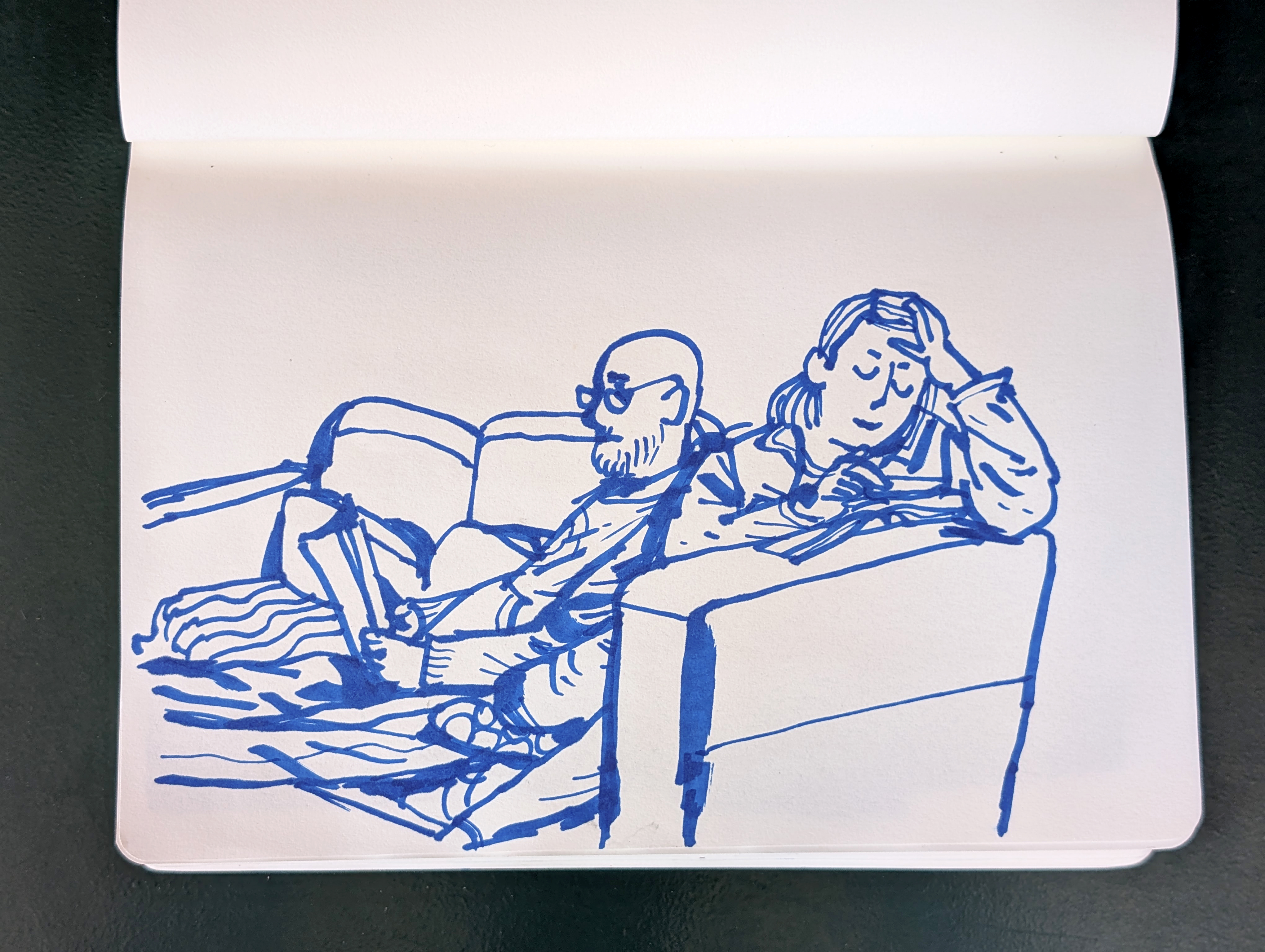 Artist sketchbook; an ink drawing of a woman on a sofa