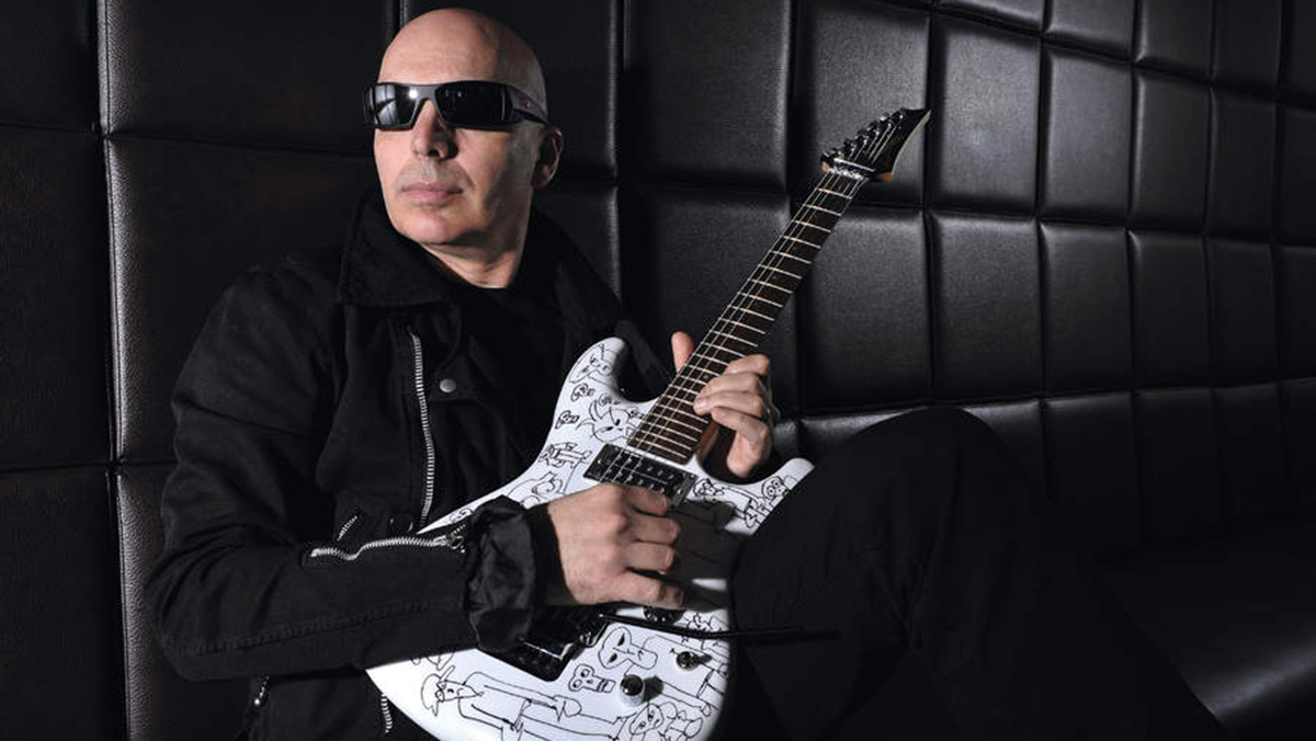 American guitar virtuoso Joe Satriani posing with an ibanez JS2400 signature guitar, taken on March 23, 2007