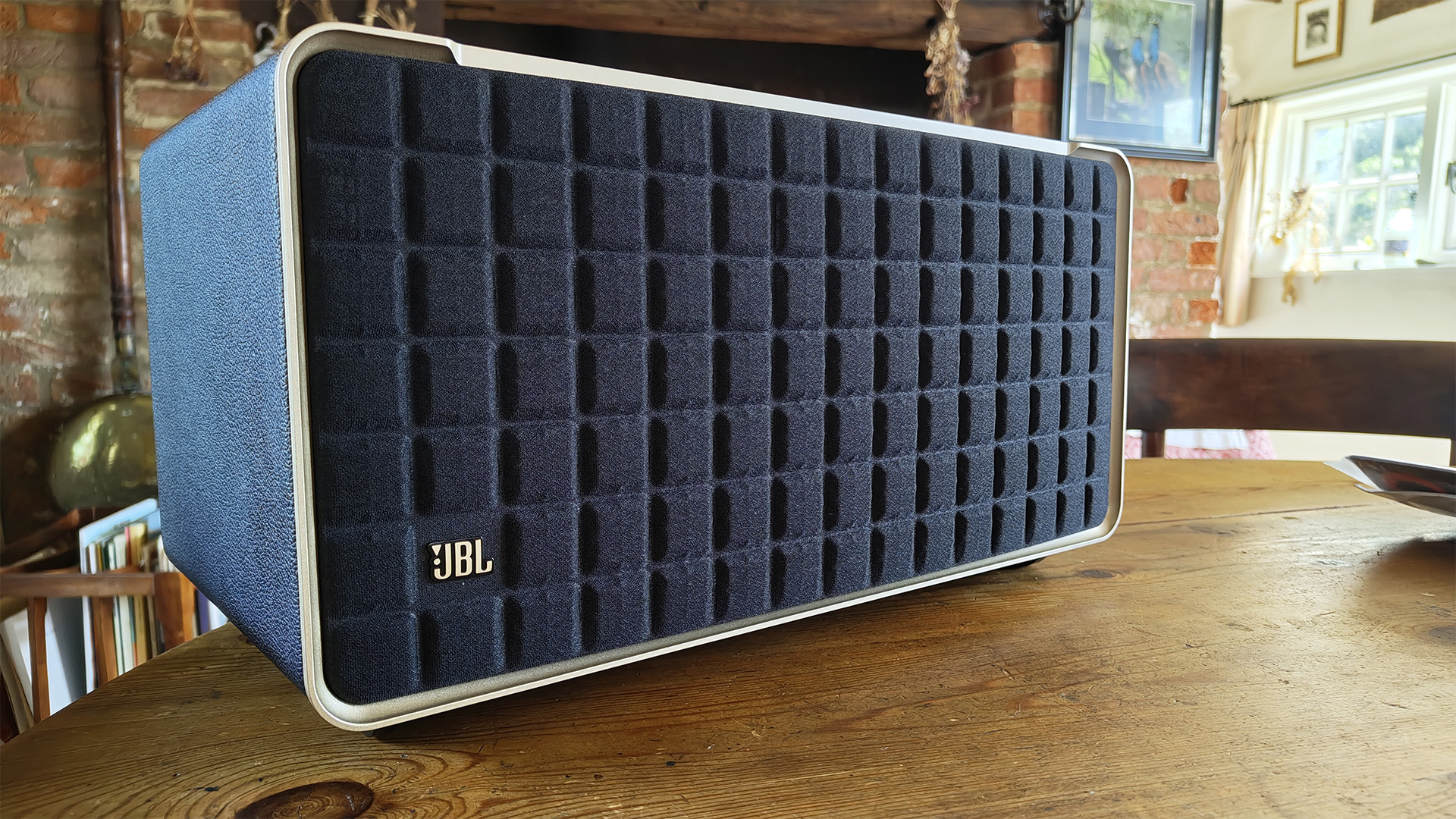 JBL Authentics 500 wireless speaker slight angle showing waffle-grille design