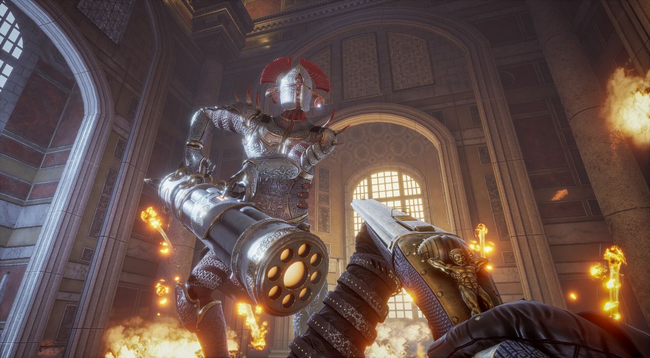 aiming shotgun up at large armored monster in a well lit chamber