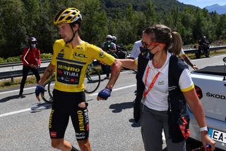 Primoz Roglic is checked by the race doctor