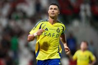 DAMMAM, SAUDI ARABIA - SEPTEMBER 20: Cristiano Ronaldo of Al Nassr celebrates after scoring the 1st goal during the Saudi Pro League match between Al Ettifaq and Al Nassr at Al Ettifaq Stadium on September 20, 2024 in Ad Dammam, Saudi Arabia. (Photo by Yasser Bakhsh/Getty Images)