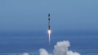 A Rocket Lab Electron rocket lifts off from New Zealand's Mahia Peninsula carrying two BlackSky satellites, on Dec. 8, 2021 (Dec. 9 local time).