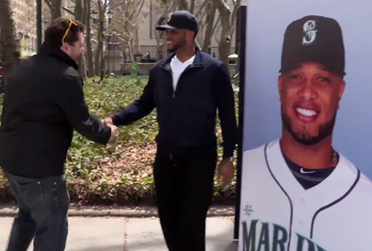 Yankees fans boo Robinson Cano's headshot. Then the real Cano shows up.