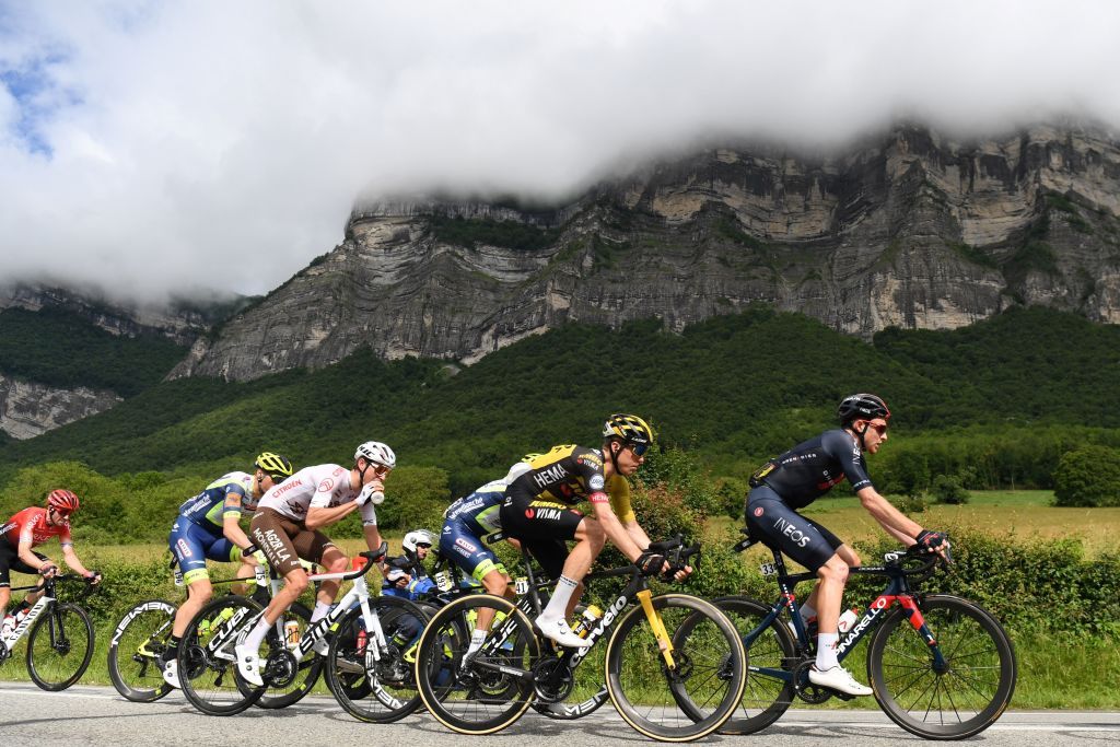 TOPSHOT The pack rides during the seventh stage of the 73rd edition of the Criterium du Dauphine cycling race a 171km between SaintMartinLeVinoux and La Plagne on June 5 2021 Photo by Alain JOCARD AFP Photo by ALAIN JOCARDAFP via Getty Images