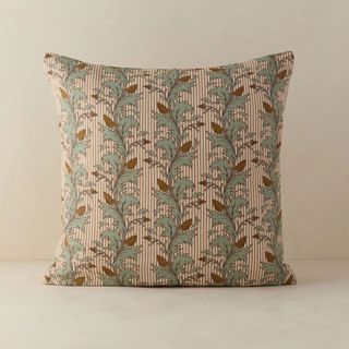 green and terracotta floral patterned pillow