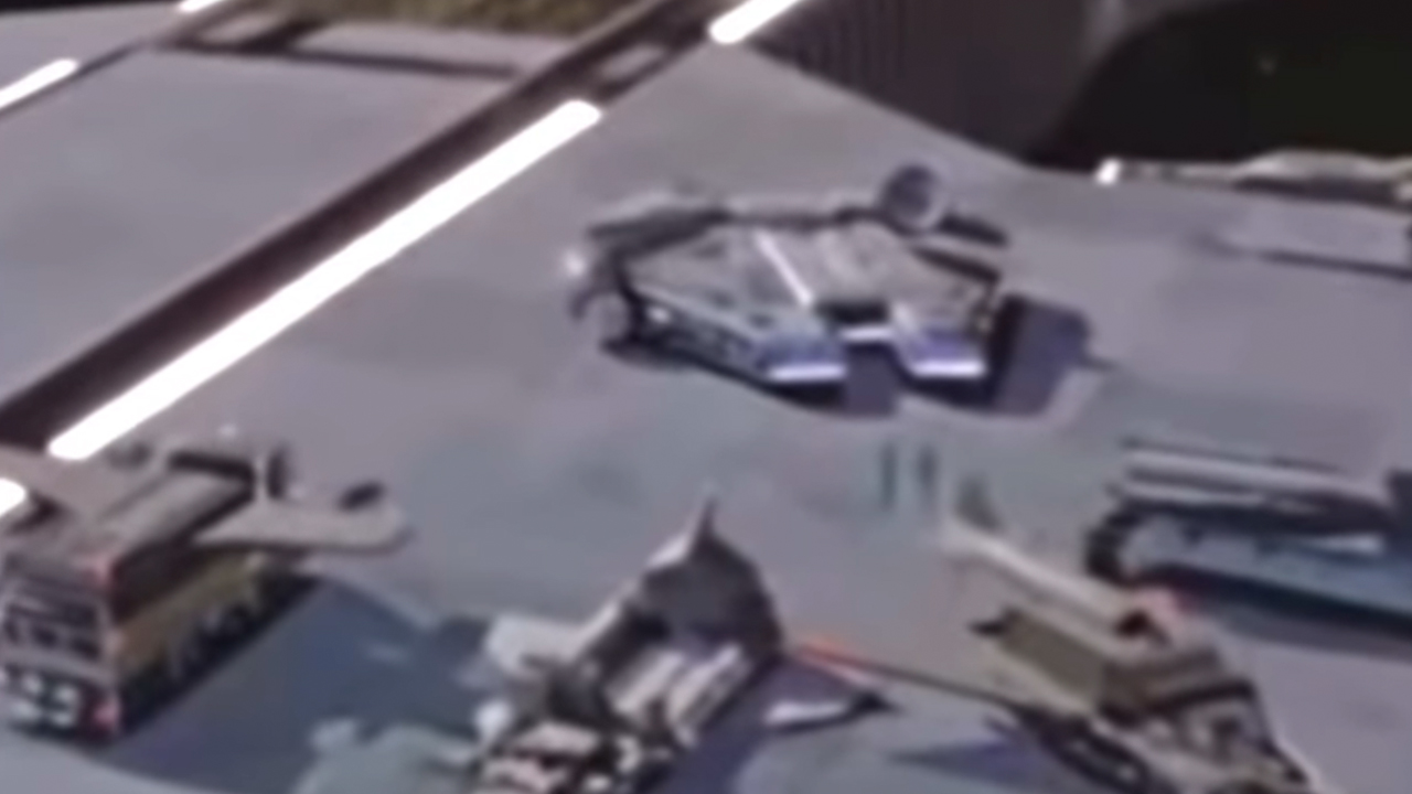 Millennium Falcon parked next to the flying RV in Spaceballs