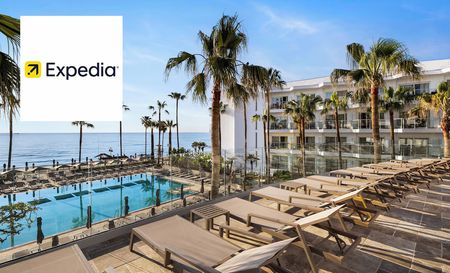 Expedia's picture of their resort with a pool and chairs