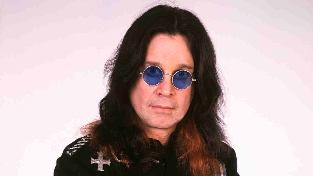 Ozzy Osbourne posing for a photograph in the early 2000s