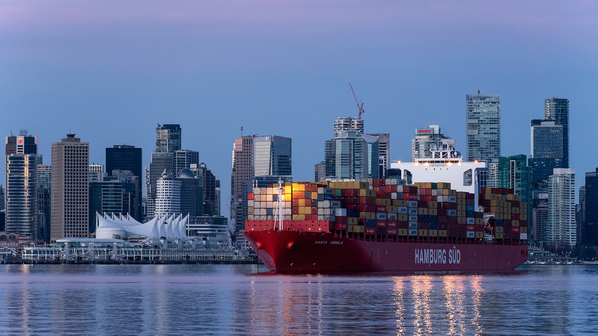 A container ship at Canada Place in Burrard Inlet in North Vancouver, British Columbia, Canada
