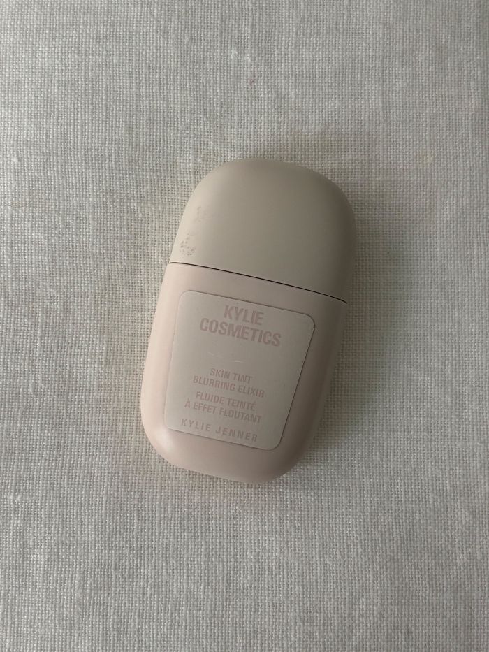 The Kylie Cosmetics Skin Tint on a white background