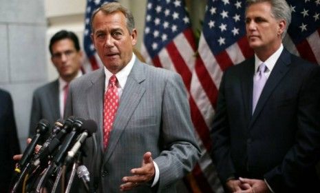 Speaker of the House John Boehner (R-Ohio) speaks during a news conference July 10 on Capitol Hill: House Republican leadership discussed President Obama&amp;#039;s push to extend tax cuts for middle 