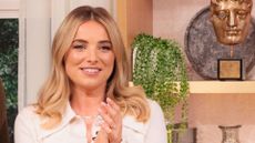 sian welby wearing a white shirt 