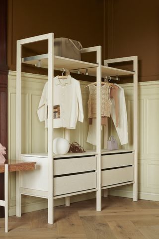 a open shelving unit in a bedroom