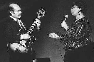 Joe Pass (left) with Ella Fitzgerald at the taping of the PBS live concert TV series Soundstage