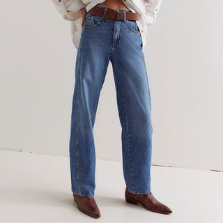 Cropped image of denim jeans 