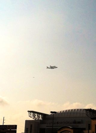 Shuttle Endeavour over Reliant Stadium, Houston, TX
