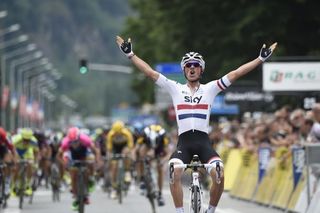 Peter Kennaugh holds off the charging field to take stage 1 of the Criterium du Dauphine.