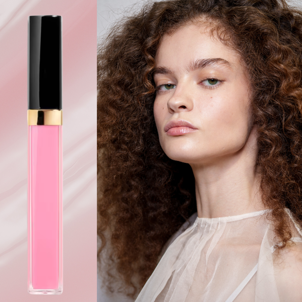 A woman wearing pink lip gloss who has big curly red hair and glowing skin, next to a bottle a bottle of pink lip gloss.