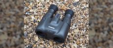 Close up Canon 10x20 IS Binoculars.