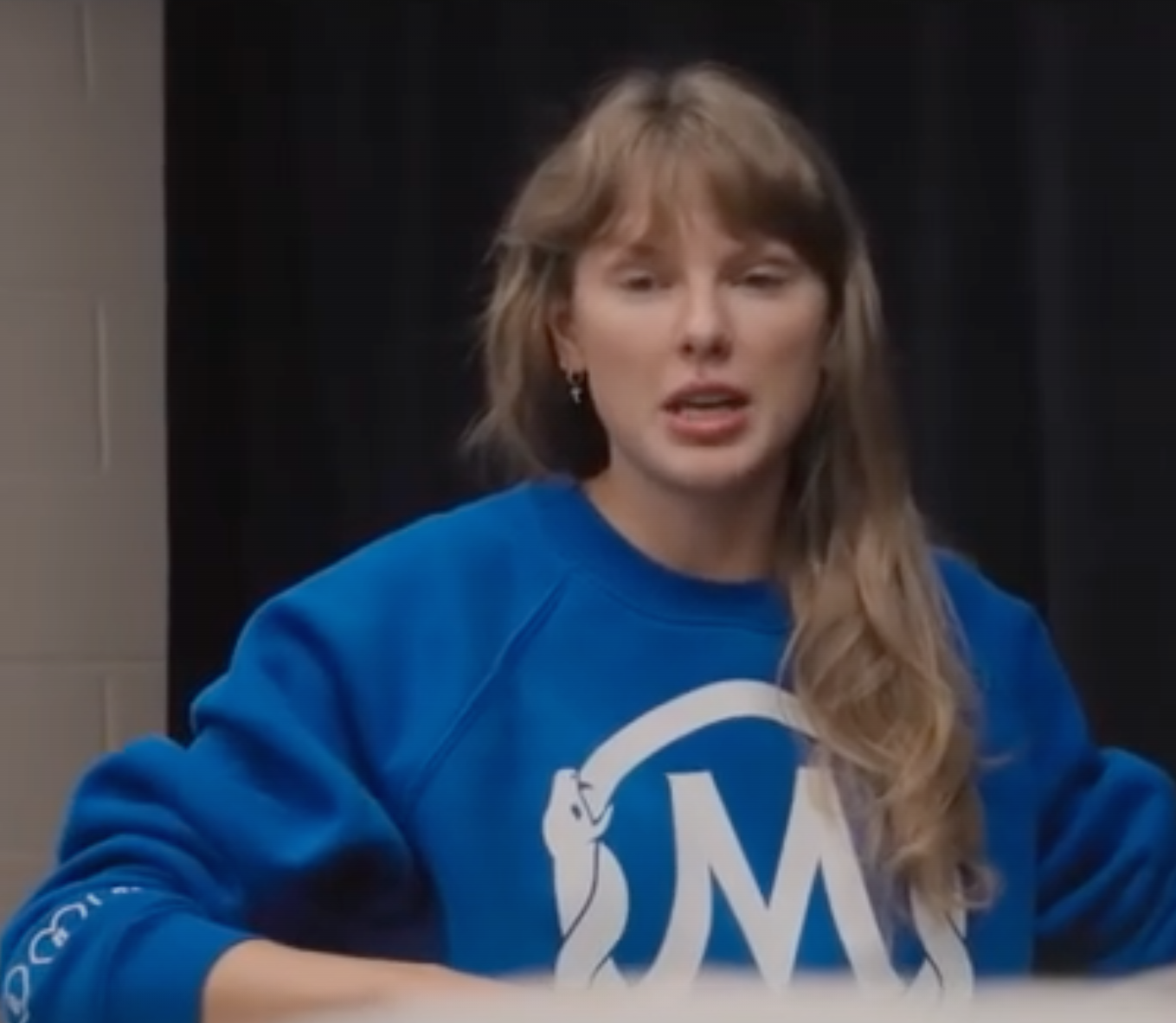Taylor Swift wearing a blue Mamba &amp;amp; Mambacita Sports Foundation sweatshirt in 'The End of an Era'