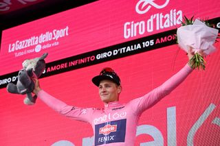 VISEGRAD HUNGARY MAY 06 Mathieu Van Der Poel of Netherlands and Team Alpecin Fenix celebrates at podium as pink leader jersey winner during the 105th Giro dItalia 2022 Stage 1 a 195km stage from Budapest to Visegrd 337m Giro WorldTour on May 06 2022 in Visegrad Hungary Photo by Stuart FranklinGetty Images