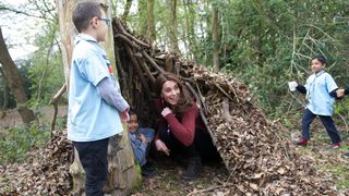 Kate Middleton playing with Cub Scouts