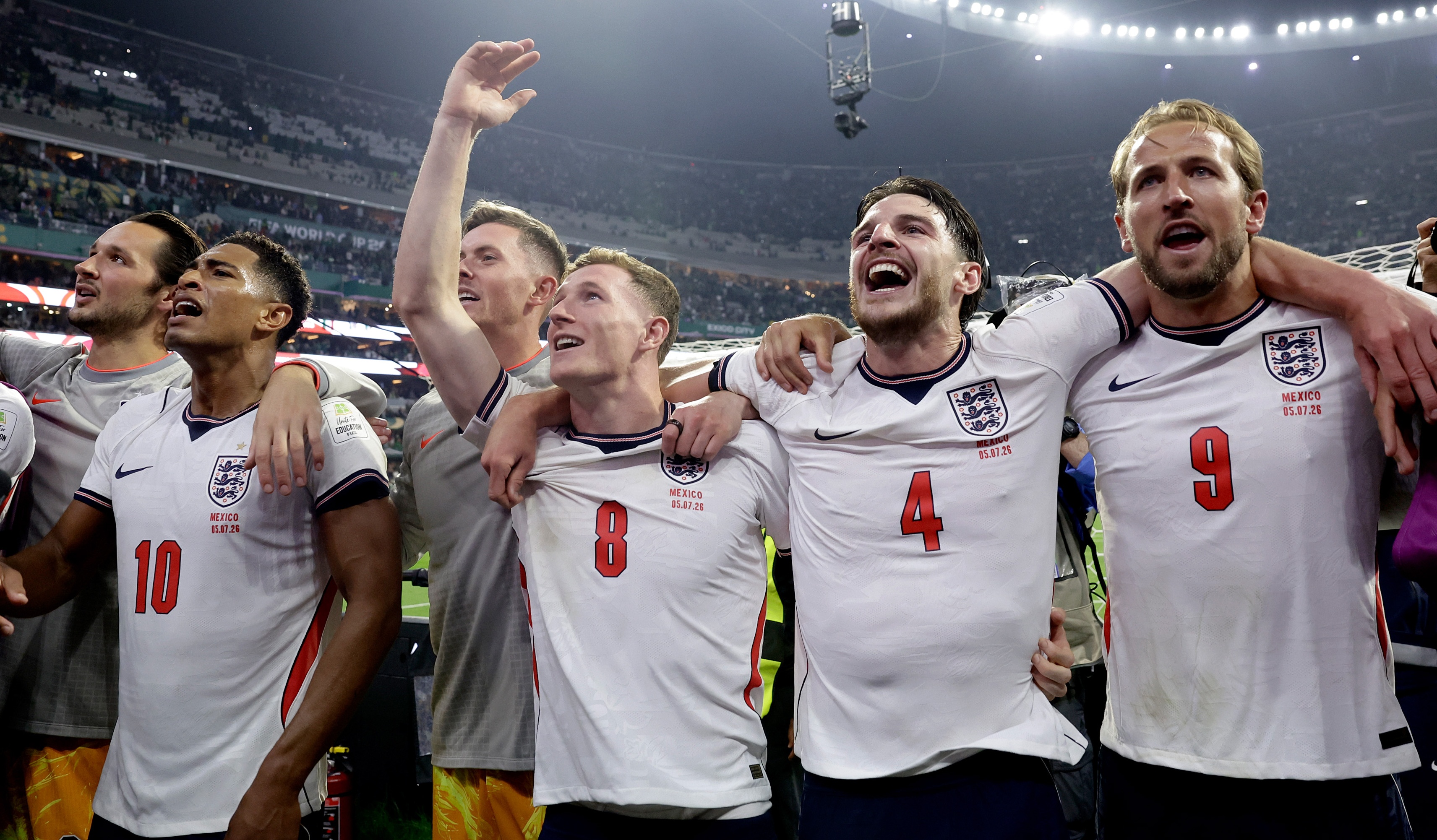 Morgan Rogers, Jude Bellingham, James Trafford, Dean Henderson, Elliot Anderson, Declan Rice and Harry Kane celebrate England's FIFA World Cup last-16 victory over Mexico in Mexico City Mexico