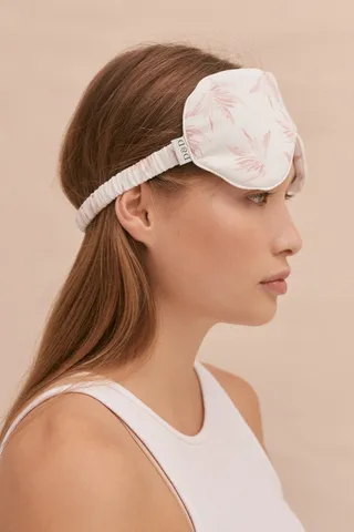 Deia eye mask by Desmond & Dempsey with pink and white design.