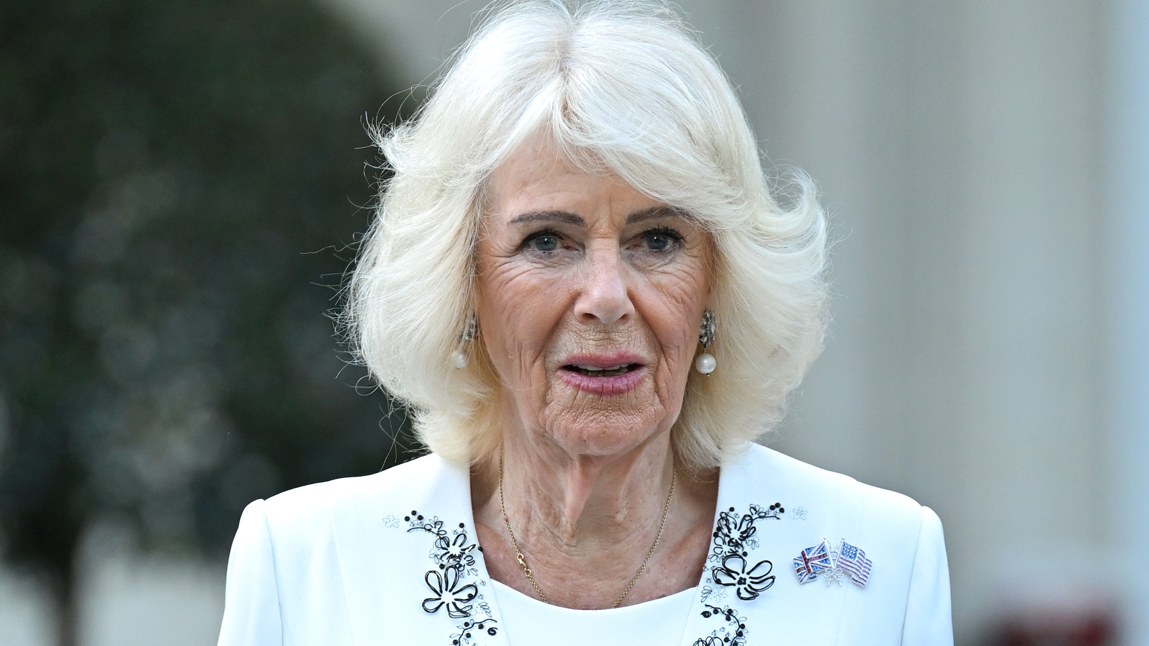 Queen Camilla smiles during a Garden Party on day one of their State Visit to the United States of America, on April 27, 2026
