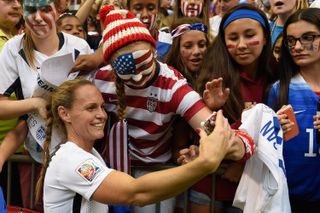 Christie Pearce taking photos with fans