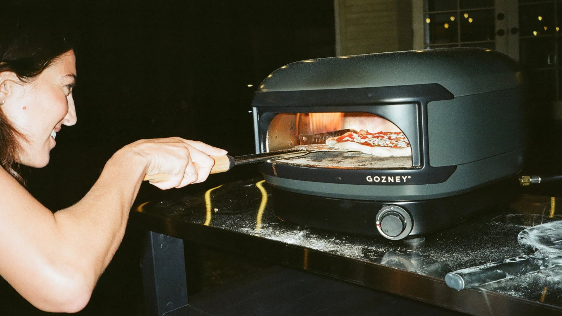 The Gozney Arc Lite Pizza Oven being used to cook pizza