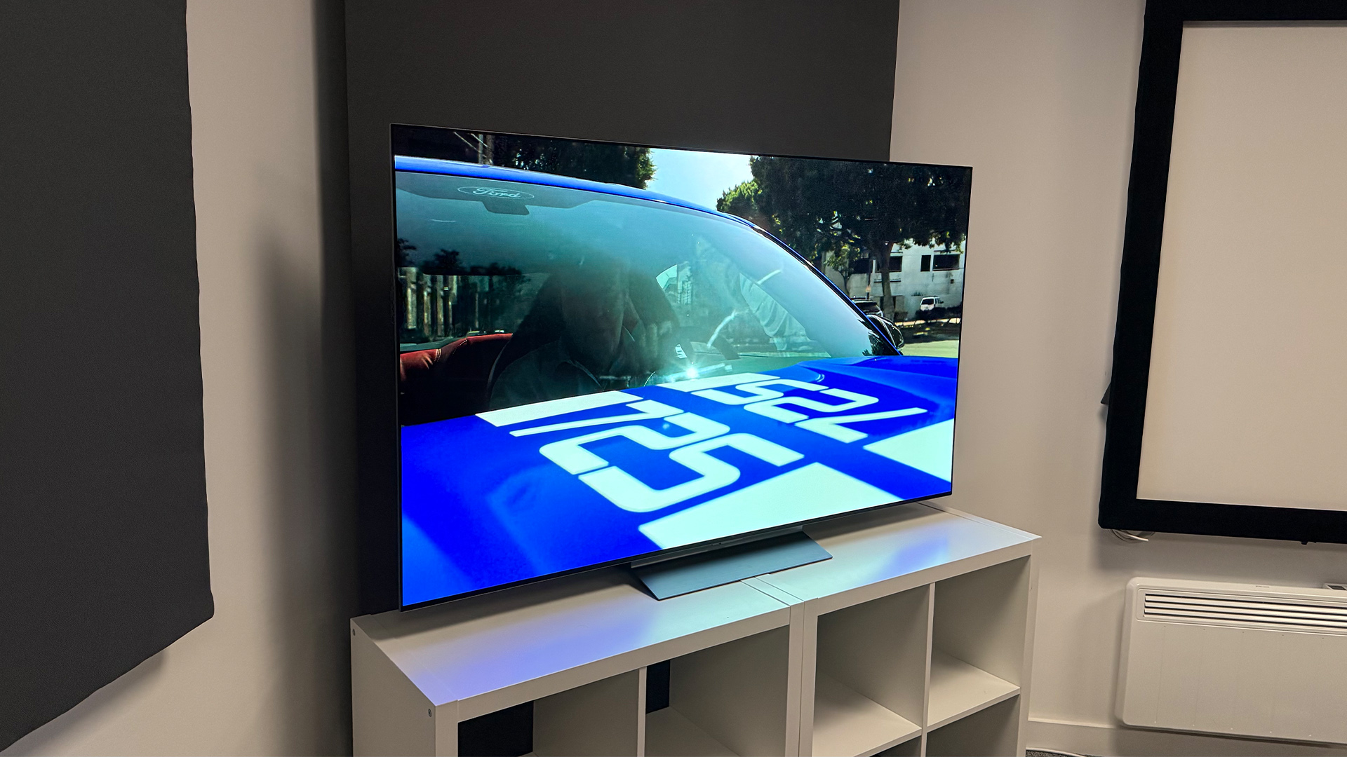 LG C6 OLED TV in corner of test room on screen is close up of car windscreen