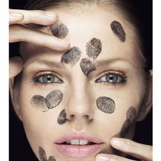 face with fingertips