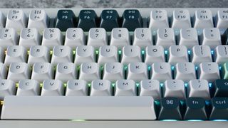 The Keychron Q1 HE magnetic keyboard in white and green