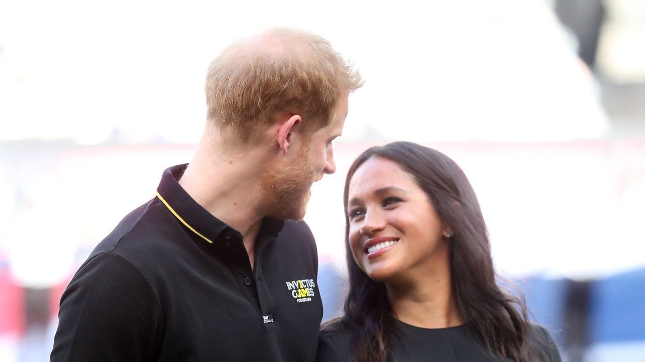 london, england june 29 in this handout image provided by the invictus games foundation, prince harry, duke of sussex and meghan, duchess of sussex prepare to watch the first pitch as they attend the boston red sox against the new york yankees match at the london stadium on june 29, 2019 in london, england the historic two game you just can’t beat the person who never gives up series marks the sport’s first games ever played in europe and the invictus games foundation has been selected as the official charity of mitel and mlb london series 2019 photo by handoutchris jacksoninvictus games foundation via getty images