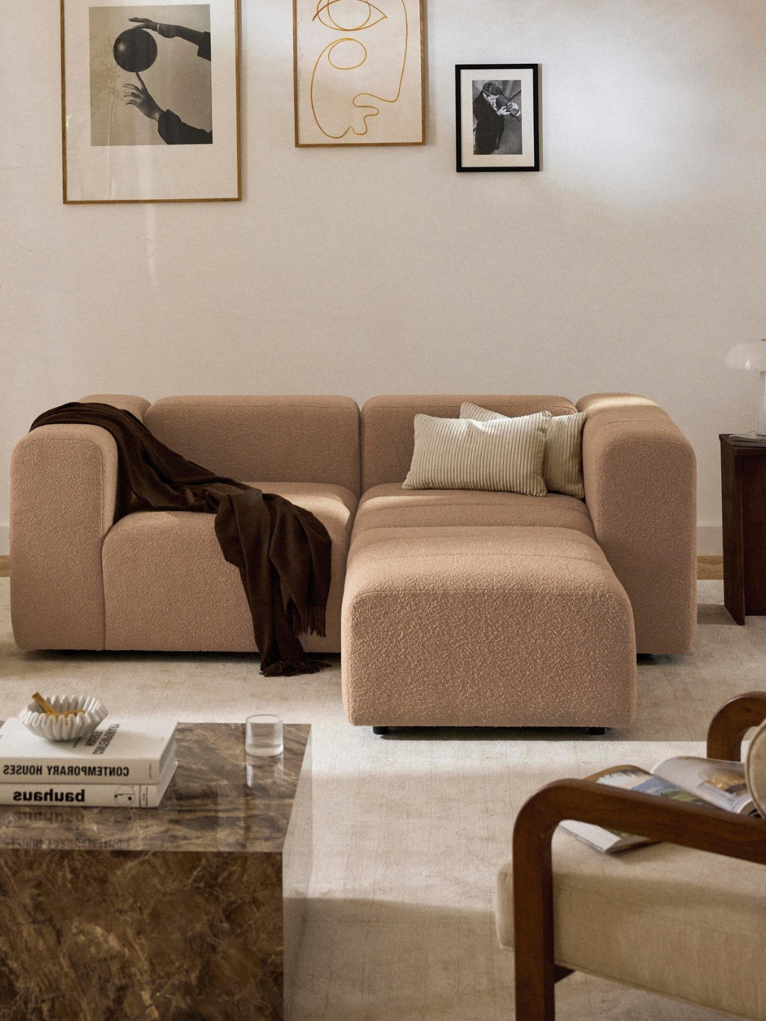 A boucl&amp;eacute; modular sofa with an ottoman from Westwing