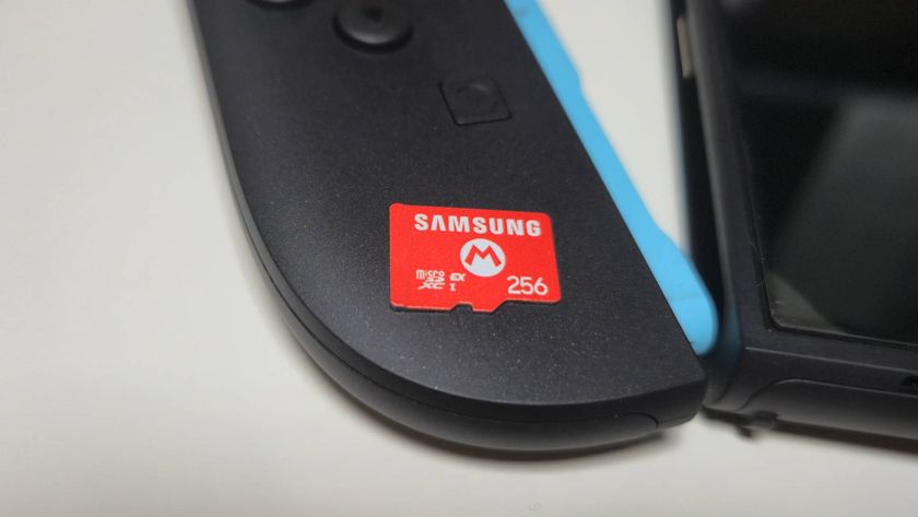 Photo by Rosalie Newcombe of the Samsung 256GB microSD Express Card sitting on the left Joy-Con 2 controller of a Nintendo Switch 2.