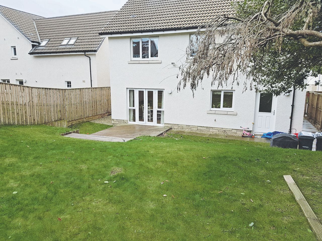 new build estate house before modern extension