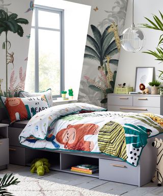 boys bedroom with jungle theme wallpaper and storage bed