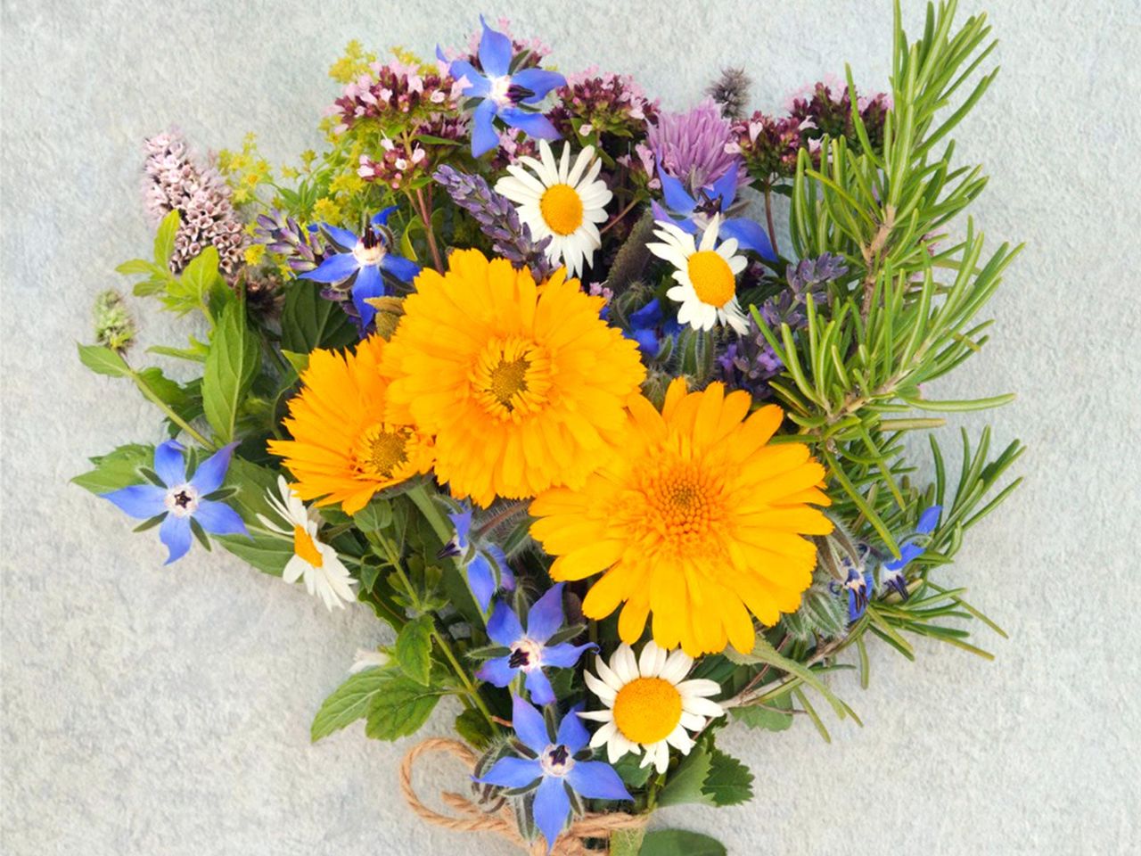 nosegay posy of herbs and flowers fastened with twine